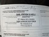 a close up of a parking ticket on a car