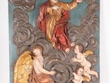 an image of a statue of jesus and angels in the clouds