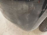 a close up of a car ' s rear bumper