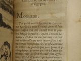 an open book with a picture of a man and a woman on it
