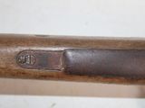 a close up of a metal object on a wooden table