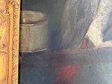 painting of a bird sitting on a ledge in a gold frame