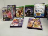 a lot of video games sitting on a table