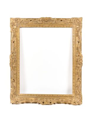 an antique gold frame with a white background
