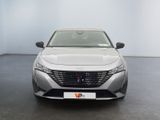 the front view of a silver car in a white room