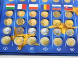 a blue box with a lot of different coins on it