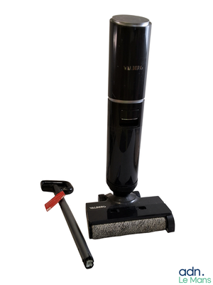 a vacuum that is sitting next to a toothbrush