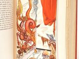 an open book with a picture of an octopus and a cat