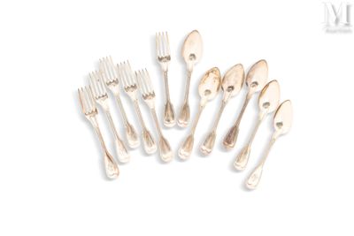 a lot of forks and spoons on a white surface