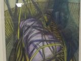 painting of a basket with a purple bag in it on a table