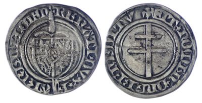 une pièce d'argent avec une croix au recto et une croix au verso