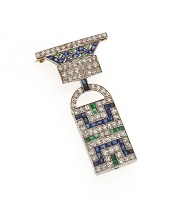 une broche Art déco sertie de diamants, de saphirs et d'émeraudes