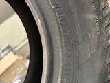the tire of a car that is sitting on top of a table