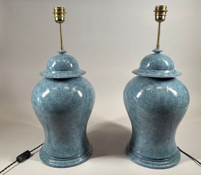 pair of blue glazed urns with brass bases