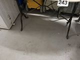 a small table with a starfish on it in a room