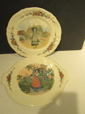 two plates that are sitting on a table