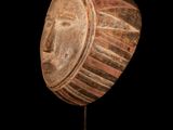 an image of a wooden object on a black surface