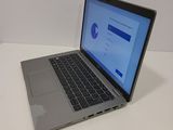 a laptop that is sitting on a table