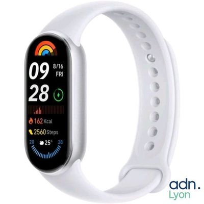a close up of a smart watch with a white band