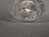 a close up of a glass of water on a table