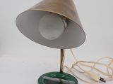 a lamp that is on a table with a cord