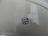 a white plate with a blue and white design on it