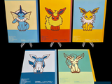 four cards with different pokemon characters on them