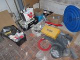 a picture of a room with a lot of tools on the floor