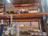 many shelves in the warehouse with many items on them