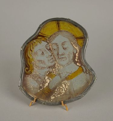 une plaque de verre sur laquelle figure l'image d'un homme et d'une femme