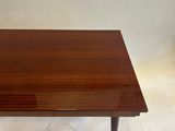 an image of a coffee table with a wooden top and metal legs