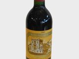 a bottle of wine that is sitting on a table