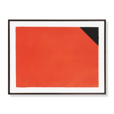 an orange and black painting on a white wall