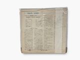 an old newspaper with a picture of a man in a suit and tie