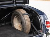 a car with a flat tire in the back of it