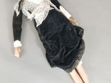 a doll that is laying down on the floor