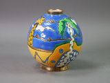 a blue and yellow vase with a painting on it