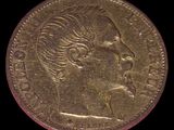 l'image d'une pièce d'or sur laquelle figure le visage d'une femme
