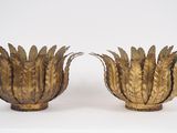 pair of brass flower vases on a white background