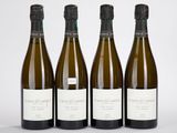 trois bouteilles de vin posées l'une à côté de l'autre sur une table
