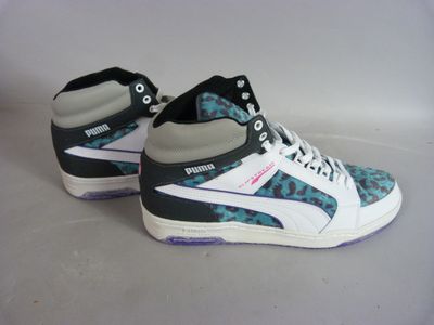a close up of a pair of shoes on a table