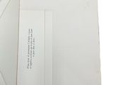 an open book with a picture of a man in a tuxedo