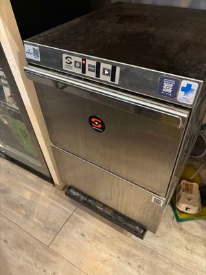 a silver dishwasher and a black dishwasher next to each other