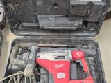 a tool in the case that is sitting on the floor