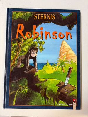 Le livre pour enfants représente un singe dans un arbre.
