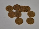 a lot of coins that are on the table
