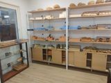 a room with shelves and shelves filled with different types of items