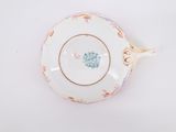 an image of a tea cup and saucer on a white surface