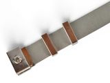 a close up of a watch strap on a white surface