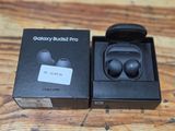 a box with a pair of earphones in it on a table